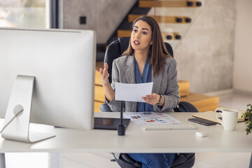 Fototapeta na wymiar Female entrepreneur with computer working in modern office. Technology,people and business concept.