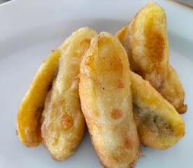 Pisang Goreng : Indonesian banana deep fried coated with batter. Selective focus.
