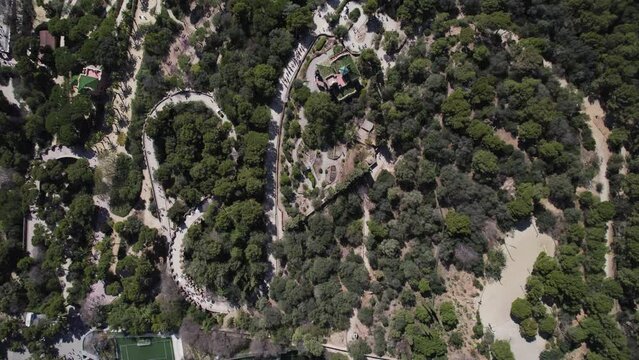 Aerial view of Casa Trias surrounded by trees, Park Guell, Barcelona, Parc del Carmel, Spain.