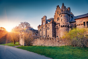 Majestic spring view of Lowenburg Castle, Kassel location, German, Europe. Superb sunrise in Schlospark. Traveling concept background.