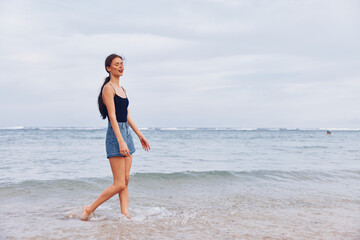 woman running sunset summer hair long beach lifestyle travel smile young sea