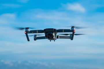 Close Up View of the Drone flies in the air. Object in focus.