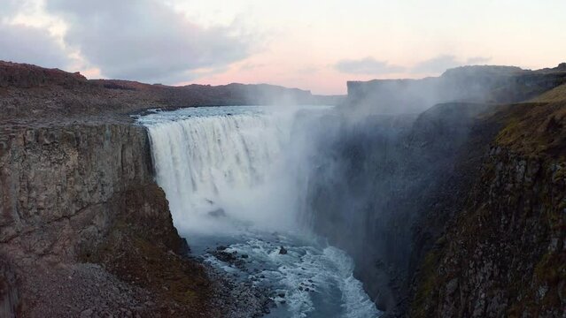 4k drone forward video (Ultra High Definition) of most powerful waterfall in Europe - Dettifoss. Fabulous summer scene of Jokulsargljufur National Park, Iceland. Beauty of nature concept background..