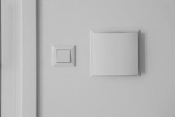 Modern switches on light wall