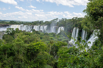 Obraz premium The Iguazu Falls a UNESCO World Heritage Site are a collection of awe-inspiring cascades formed by the Iguazu River