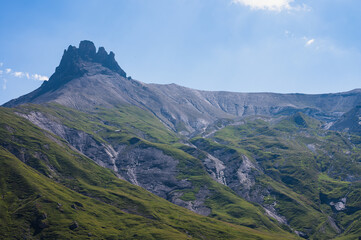 Obraz premium Bern, Switzerland - July 25, 2022 - View of Engstligenalp from the Engstligengrat hiking trail, Swiss Alps, Switzerland