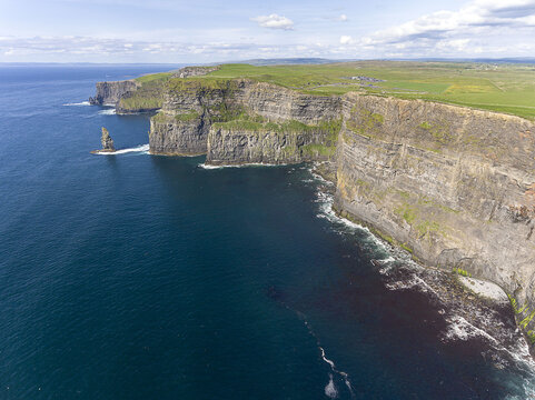 Aerial birds eye drone view from the world famous cliffs of moher in county clare ireland. Scenic Irish rural countryside nature along the wild atlantic way.