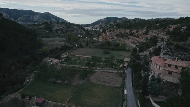 Aerial view of road with agricultural fields, Parrizal de Beceite, Rio, Spain.