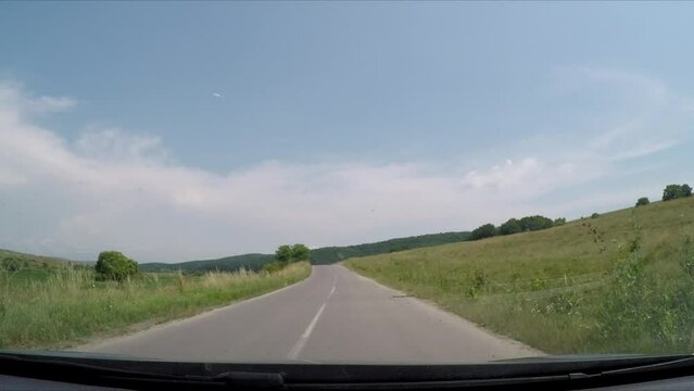 Driving through the landscape of Viscri in Romania