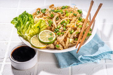 Asian shimeji noodles dish. Chow Mein noodles pasta, with stir fried vegetables, soy sauce and...