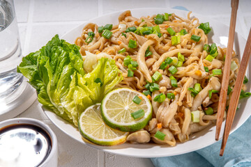 Asian shimeji noodles dish. Chow Mein noodles pasta, with stir fried vegetables, soy sauce and shimeji mushrooms