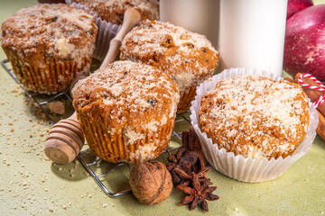 Apple pie crumble streusel muffins, Sweet autumn baking pastry with red apple slices, cinnamon and...
