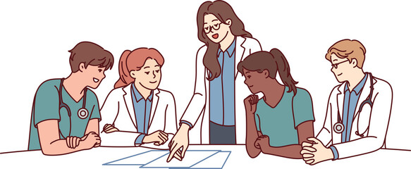 Clinic staff meeting, with doctors sitting at table and head physician giving instructions