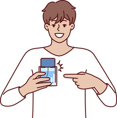 Man pointing finger at perfume bottle recommending to buy cologne or antiperspirant with cool scent