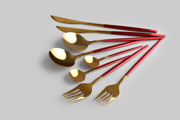 Stylish cutlery on grey background