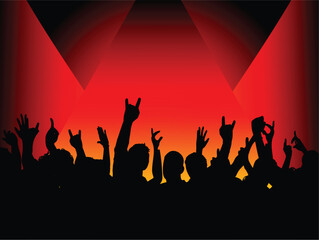 Silhouette of an excited audience under spotlights
