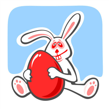 Happy easter bunny with egg on a white background.