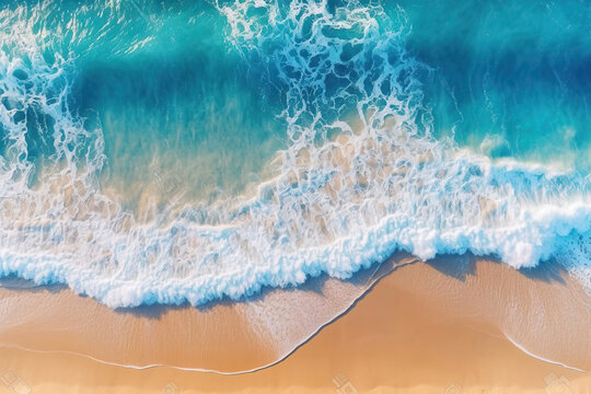 Aerial zenith photograph of a beautiful beach with turquoise or sky-blue water, with frothy waves and beautiful sandy shores on a sunny day