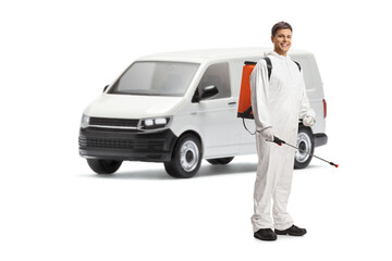Full length shot of a pest control professional in a white suit standing in front of a van