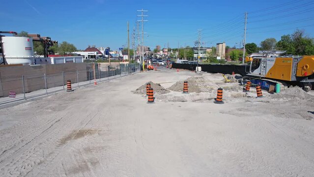 Progress of groundbreaking construction at launch shaft site at Eglinton and Midland intersection. Tunnelling for Scarborough Subway Extension. Metrolinx