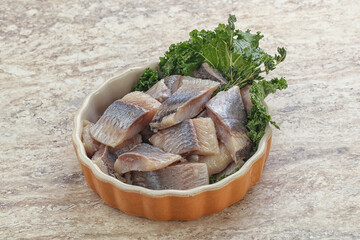 Herring fillet slice on the bowl