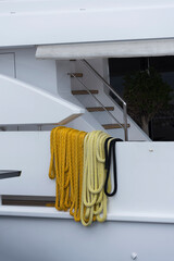 Nautical ropes hang on board the ship