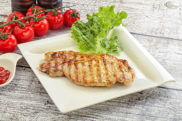 Grilled pork steak with ketchup