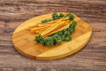 Chechel cheese sticks over board
