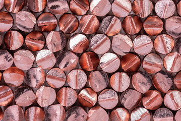 Pile of copper rod raw materials metals industry and stock market concept