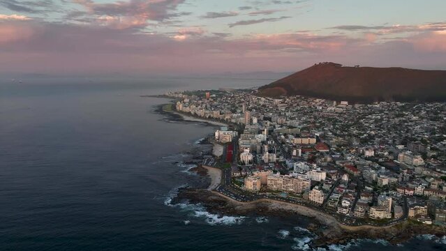 Aerial view of Atlantic Seaboard sunset with Lion&rsquo;s Head Mountain, Bantry Bay and Sea Point from Atlantic Ocean, Cape Town, South Africa.