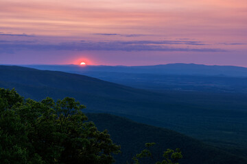 Hazy red sunset over the Shenandoah Valley in Blue Ridge Mountains Virginia