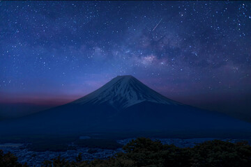 Japan icon Mt Fuji at night and  universe space and milky way galaxy with stars on night sky...