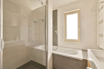 a bathroom with a sink, mirror and shower stall in the corner next to the bathtub on the wall
