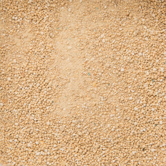 Cat Tray Filler Made of Bentonite. Falling Particles of Gray Pet Litter. Rotation. Biofuel, Biofuels, Eco Fuels. Cat's Litter Box