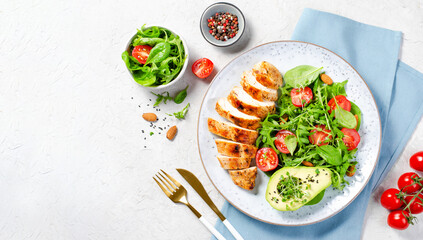 Grilled Chicken Fillet with Fresh Salad, Cherry Tomatoes and Avocado, Healthy food, Keto, Paleo Diet Menu