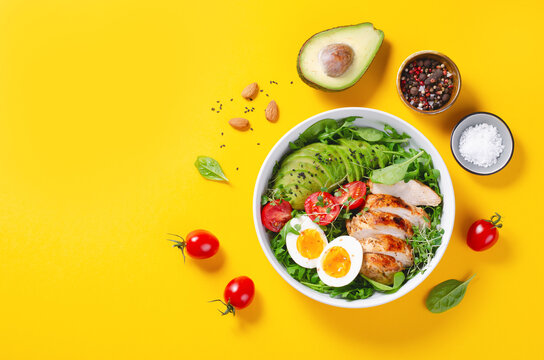Grilled Chicken Fillet with Fresh Salad, Cherry Tomatoes, Boiled Egg and Avocado, Budha Bowl, Keto Paleo Diet Menu