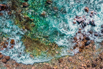 Aerial Majesty: Turquoise Waves Crashing on Kona Reef