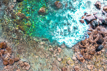 Aerial Serenity: Waves Crashing on Kona's Majestic Reef
