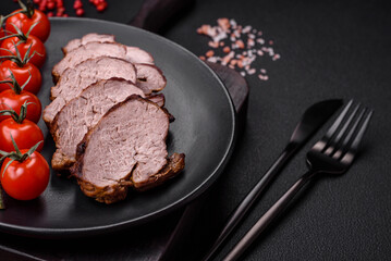 Delicious beef steak with salt, spices and herbs on a ceramic plate