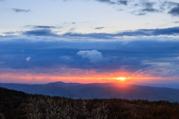 Sunset over Blue Ridge Mountains with heavy clouds
