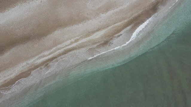 Aerial view of an empty beach along the Thracian Sea, Makri, East Macedonia and Thrace, Greece.