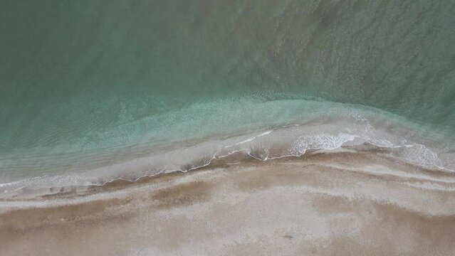 Aerial view of an empty beach along the Thracian Sea, Makri, East Macedonia and Thrace, Greece.
