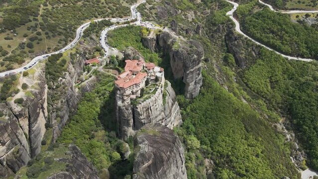 Aerial view of Iera Moni Barlaam Monastery on a natural pillar rock formation in Meteora, Trikala, Thessaly, Greece.