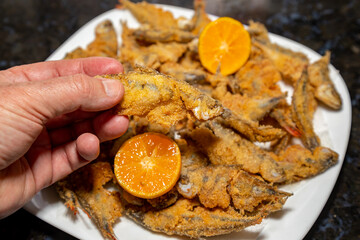 Fried Lambari do Rabo Vermelho (Astyanax bimaculatus) typical Brazilian freshwater fish