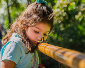 "The charm of innocence: The girl and the butterfly in a meeting full of magic"