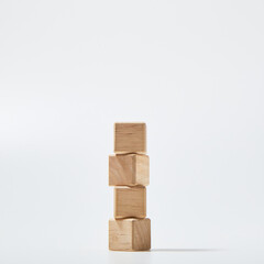 Four empty wooden cube blocks stack