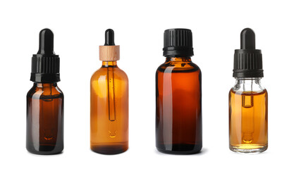 Set of different cosmetic oils in bottles on white background