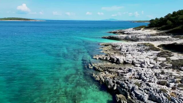 Aerial view of rugged cliffs along the wild coastline in Kamenjak, Pula, Istria, Croatia
