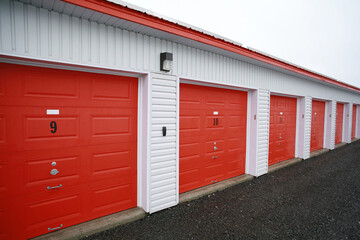 Fototapeta na wymiar Storage units with garage doors.