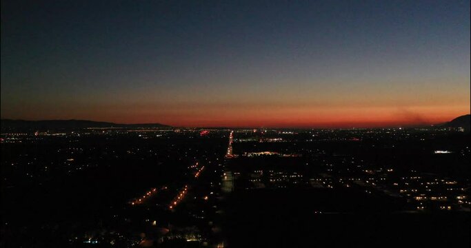 4th of July fireworks at sunset overlooking the city of Moreno Valley, California